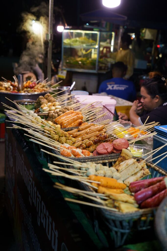 Female street food vendor at a market in Siem Reap, Cambodia