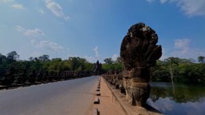Carved seven-headed naga at the head of an Angkor Thom causeway.