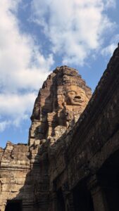 Close view of a Bayon-style carved face at Angkor Thom.