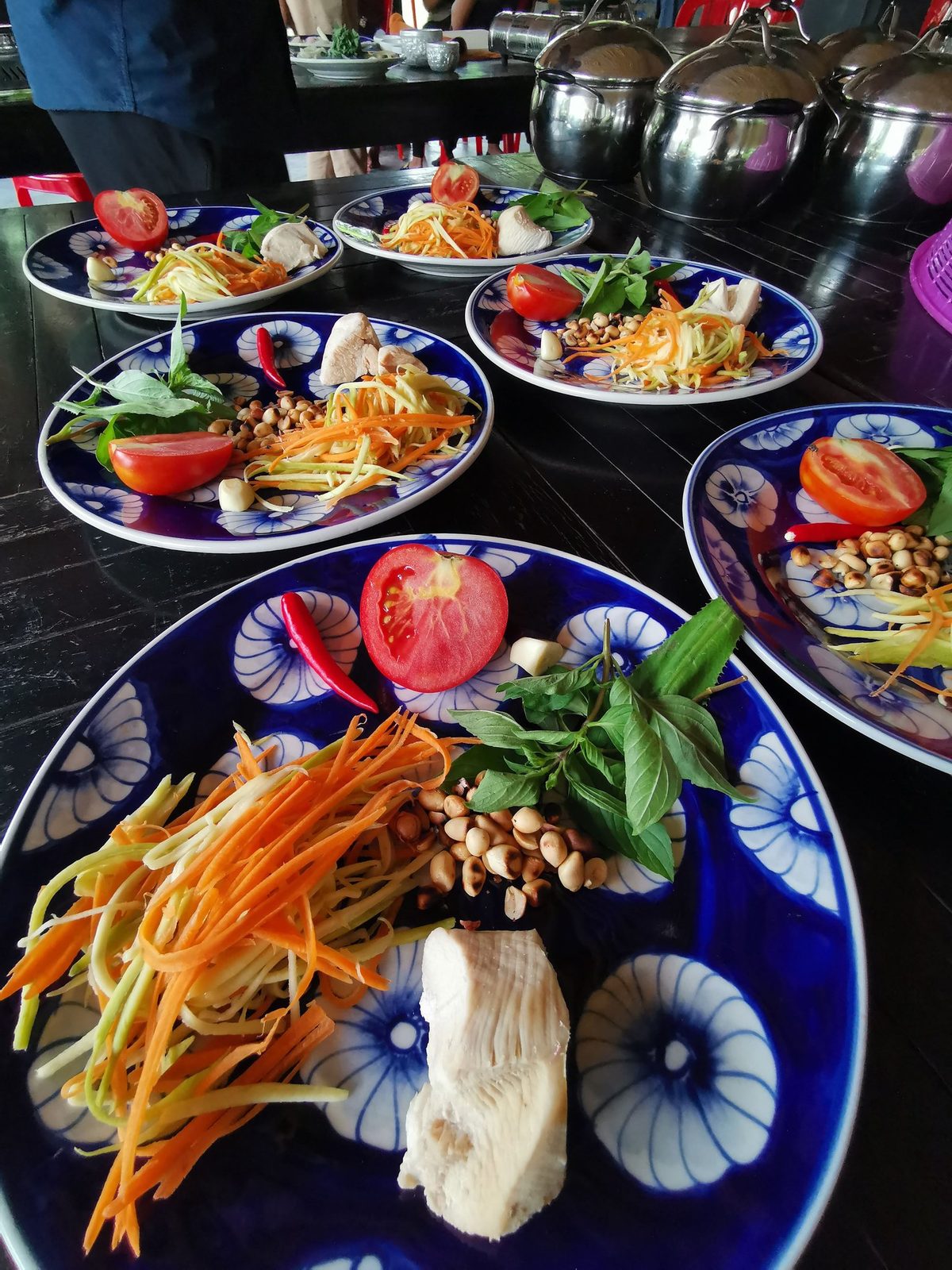 Plated Cambodian dishes from a Siem Reap kitchen