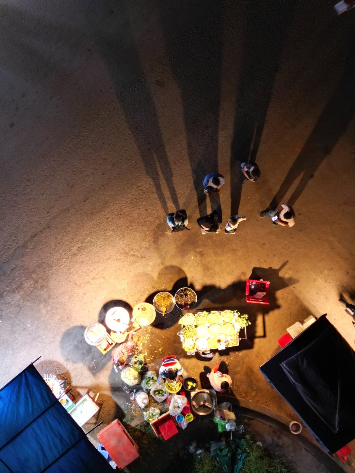 Overhead view of a Siem Reap street-food vendor and customers