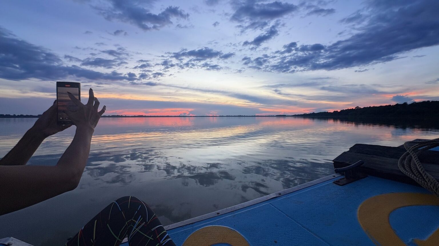 Golden sunset over the water near Siem Reap