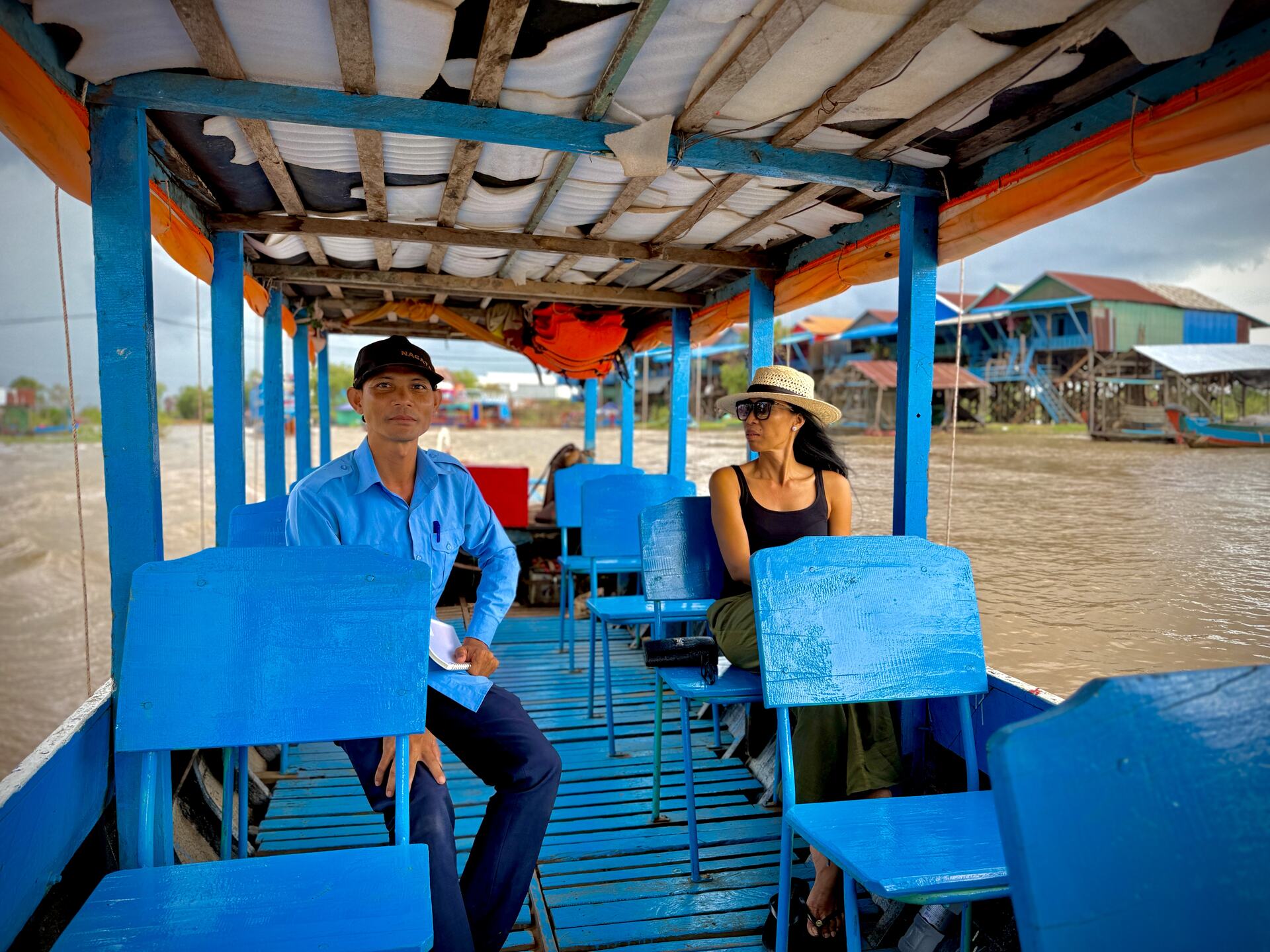 Kiri, Adventures Cambodia's guide from Kampong Phluk, on the private boat with founder Akim Ly
