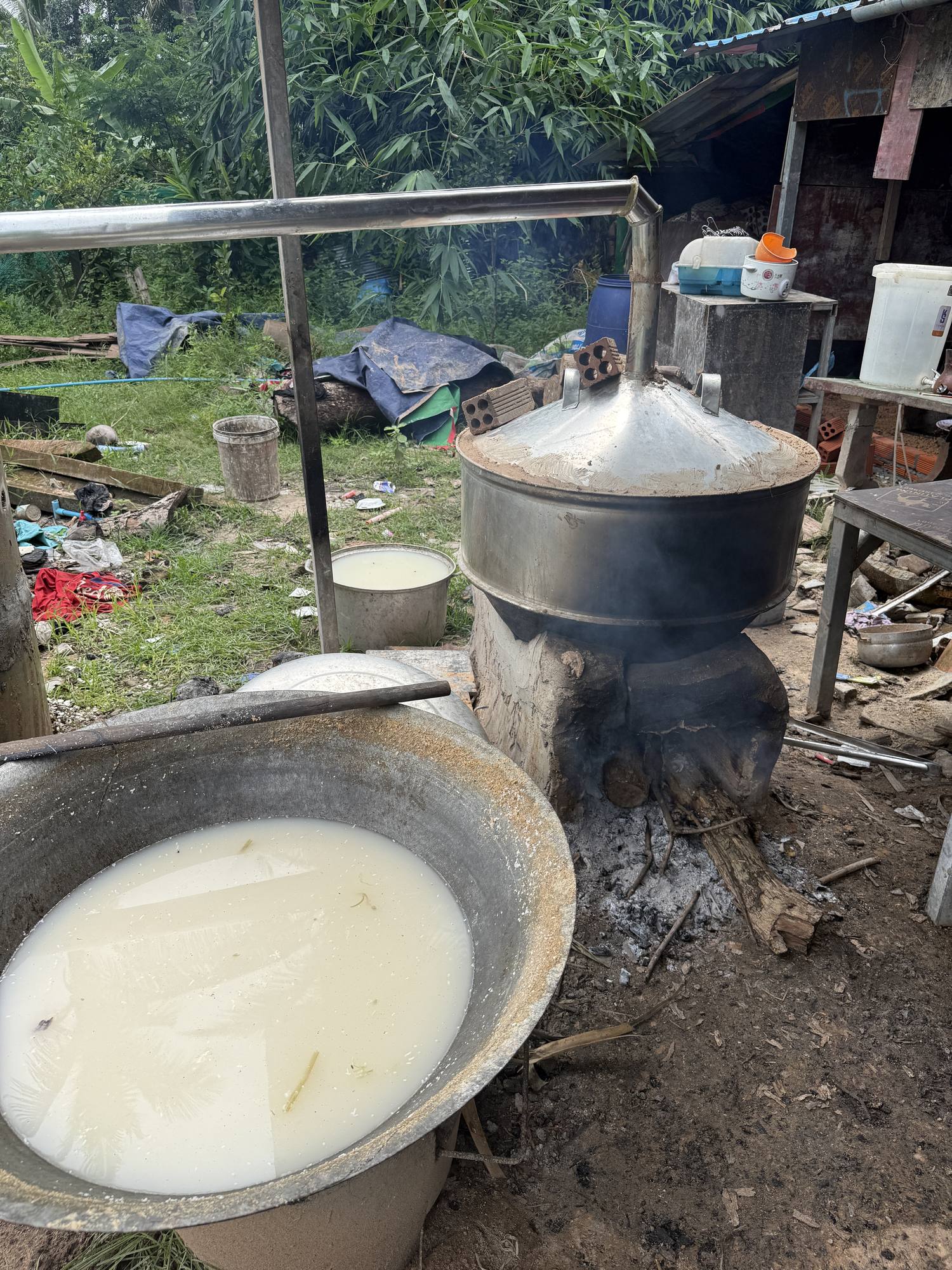 The still where fermented rice is cooked off into sra sor, the clear village rice wine